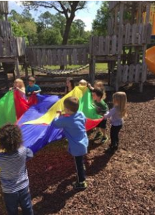 Fun with summer camp parachute paly